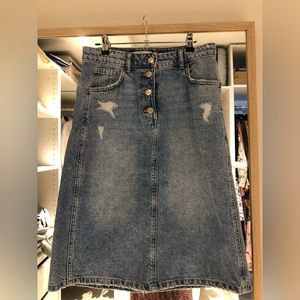 Denim knee length skirt with row of button from Zara Kids